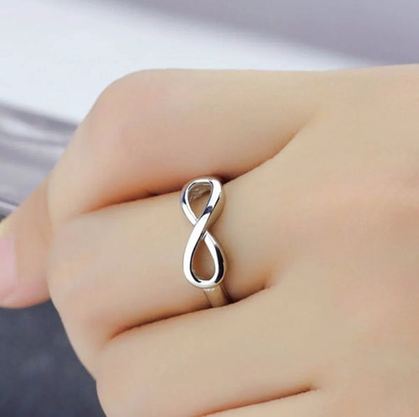Infinity ring, gold or silver tone