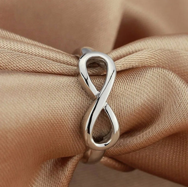Infinity ring, gold or silver tone
